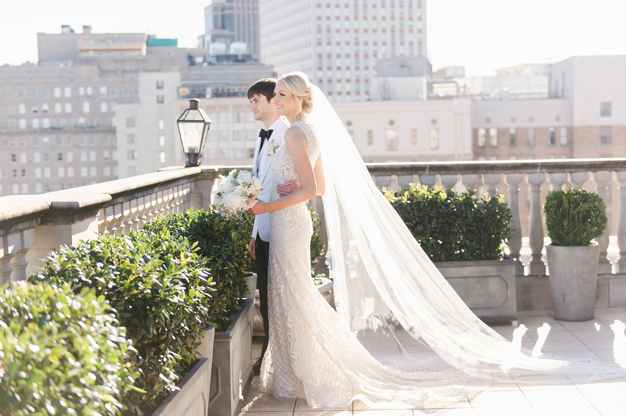 Bride and groom on rooftop