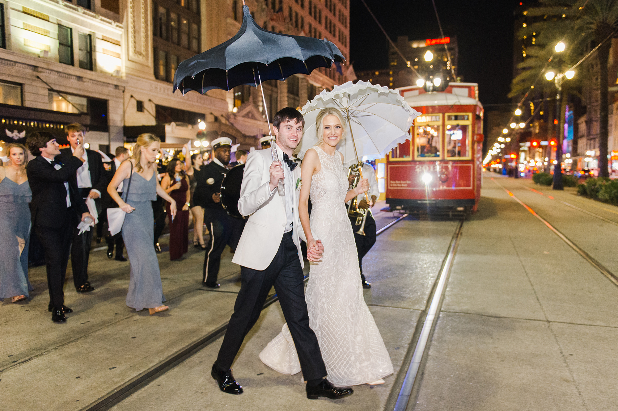 Bride and groom during second line