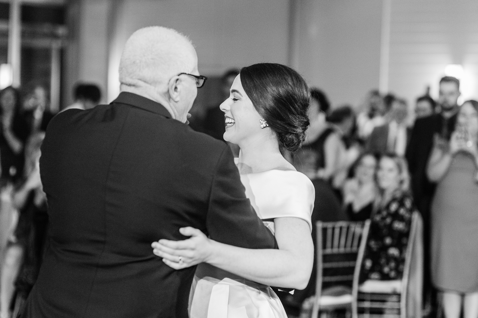 Bride and father dancing during reception