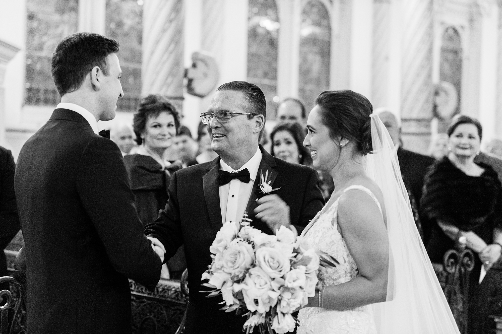 bride and father at the altar with groom