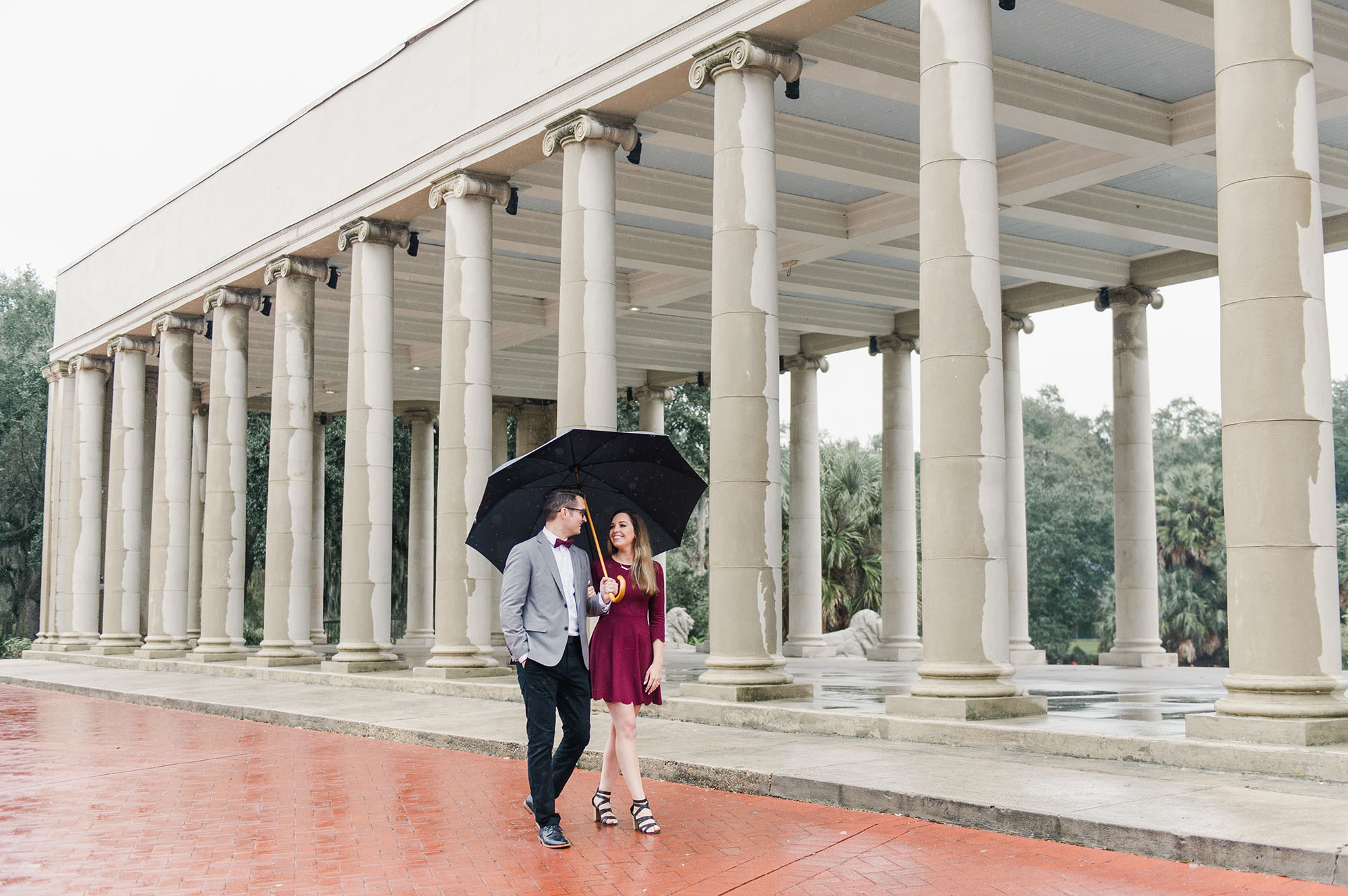 Couple with umbrella in rain